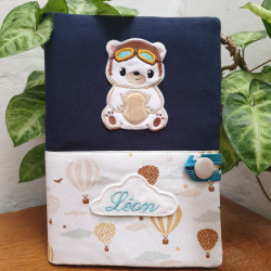 Carnet de santé ourson aviateur