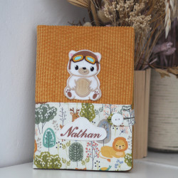 Carnet de santé ourson aviateur