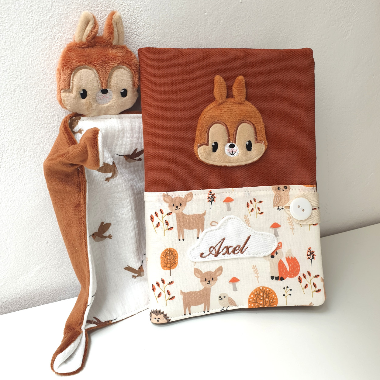 Doudou et carnet écureuils