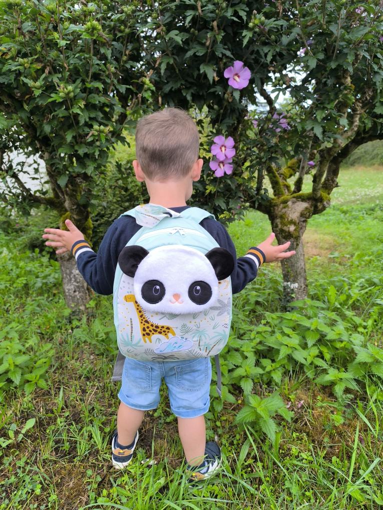 Panda, les fleurs sont dans l'arbre, pas sur le sac :)